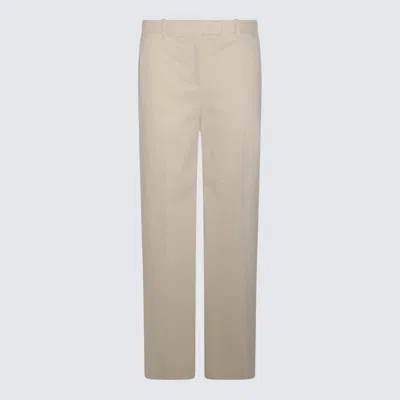 Shop The Row Trousers In Sand