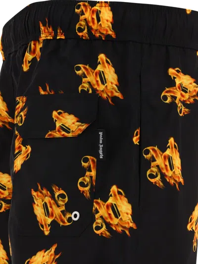 Shop Palm Angels "burning Monogram" Swim Shorts In Black