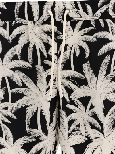 Shop Palm Angels "palms" Swim Shorts In Black