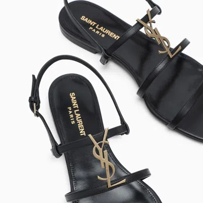 Shop Saint Laurent Cassandra Flat Sandals In Black