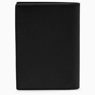 Shop Saint Laurent Vertical Bi-fold Wallet In Black
