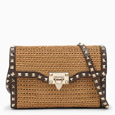 Shop Valentino Garavani Small Woven Raffia Rockstud Shoulder Bag In Brown