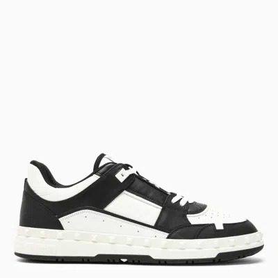 Shop Valentino Low Top Freedots Trainer In Black/white Calfskin