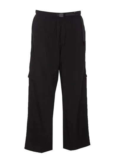 Shop Gramicci Trousers In Black