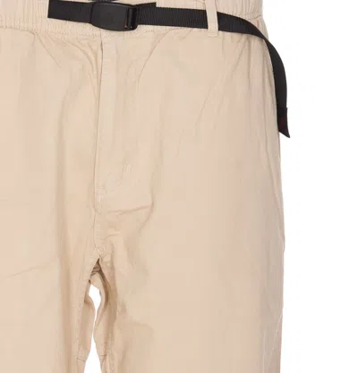 Shop Gramicci Trousers In Beige