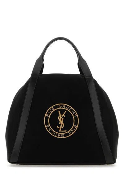 Shop Saint Laurent Handbags. In Black