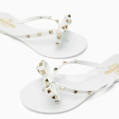Shop Valentino Garavani Rockstud Flip-flops In White
