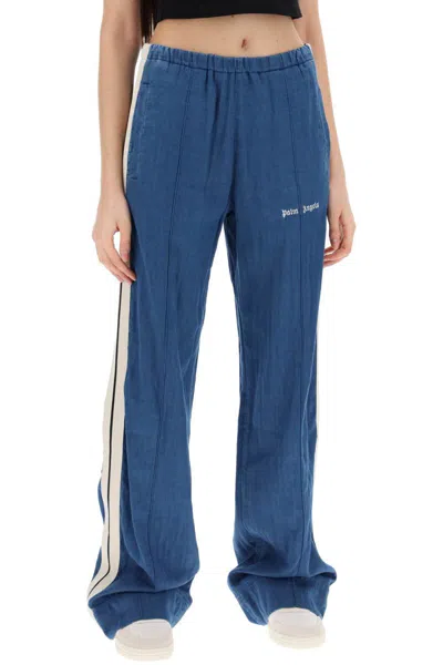 Shop Palm Angels Chambray Joggers With Side In Blue