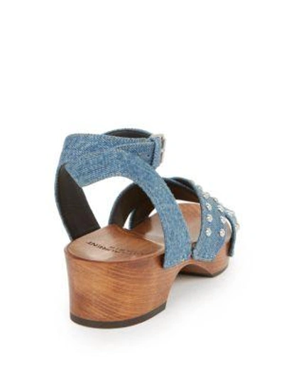 Shop Saint Laurent Studded Denim Clog Sandals In Light Blue