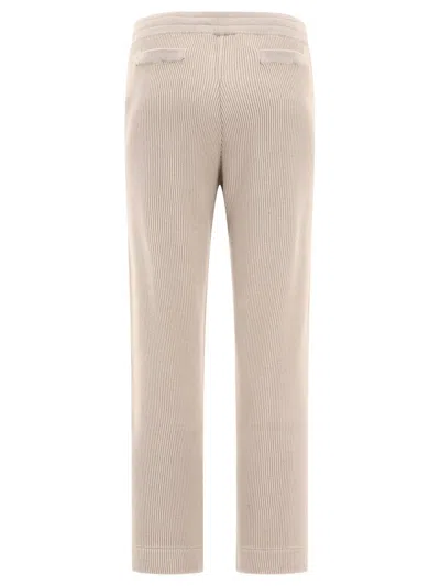 Shop Brunello Cucinelli Trousers With Shiny Eyelets In Beige