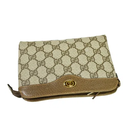 Shop Gucci Gg Pattern Beige Canvas Clutch Bag ()