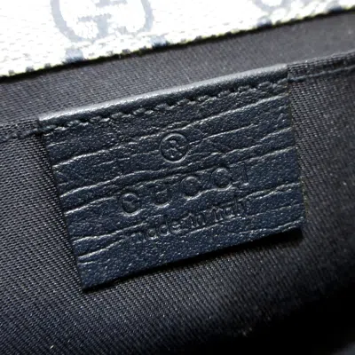 Shop Gucci Gg Plus Navy Canvas Clutch Bag ()