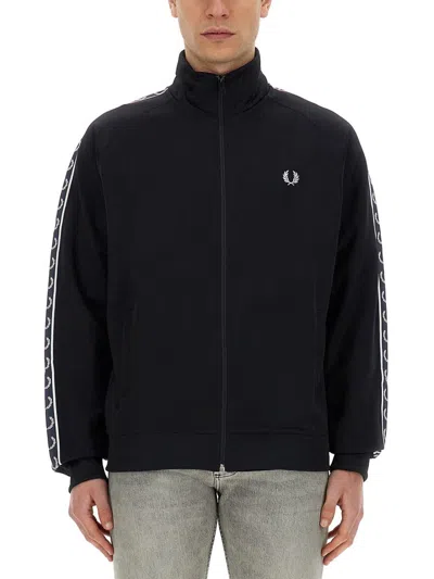 Shop Fred Perry Zip Sweatshirt. In Blue