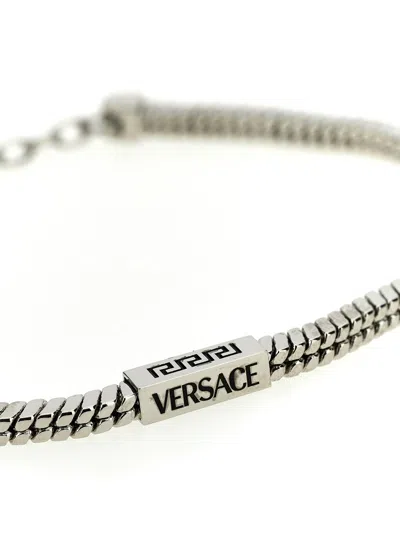 Shop Versace Logo Metal Bracelet Jewelry Silver