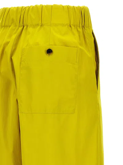 Shop Dries Van Noten Pila Pants Yellow