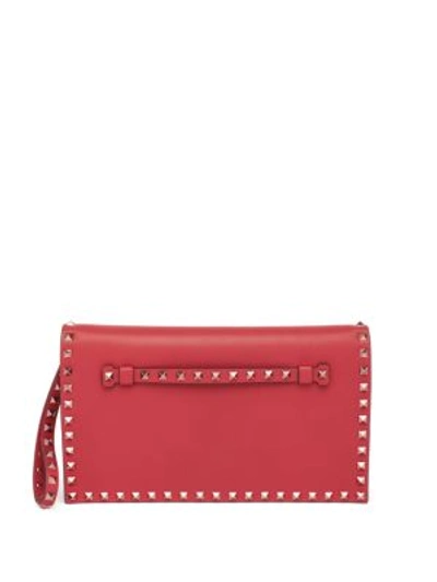 Shop Valentino Rockstud Leather Flap Clutch In Red