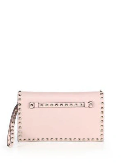 Shop Valentino Rockstud Leather Flap Clutch In Red
