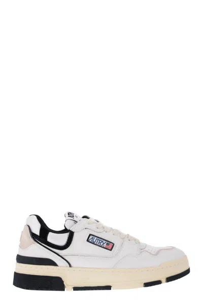 Shop Autry Clc - Leather Sneakers In White/black