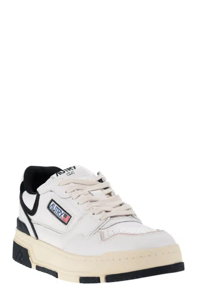 Shop Autry Clc - Leather Sneakers In White/black