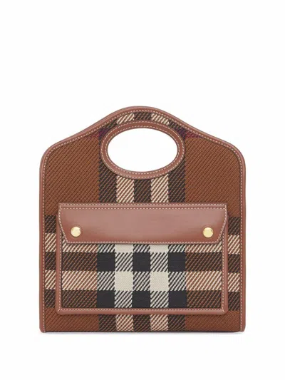 Shop Burberry Pocket Mini Handbag In Brown