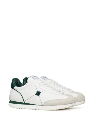 Shop Valentino Garavani Stud Around Leather Sneakers In Green