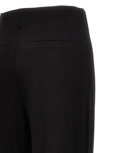 Shop Jacquemus 'apollo' Trousers In Black