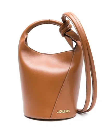 Shop Jacquemus Le Petit Tourni Bucket Bag In Brown