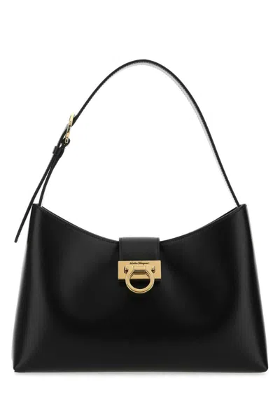 Shop Ferragamo Salvatore  Handbags. In Black