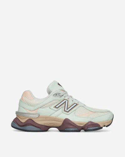 Shop New Balance 9060 Sneakers Clay Ash In White