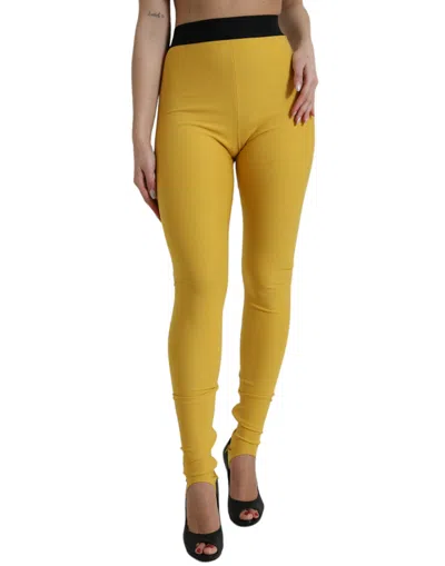 Shop Dolce & Gabbana Yellow Nylon Stretch Leggings Pants