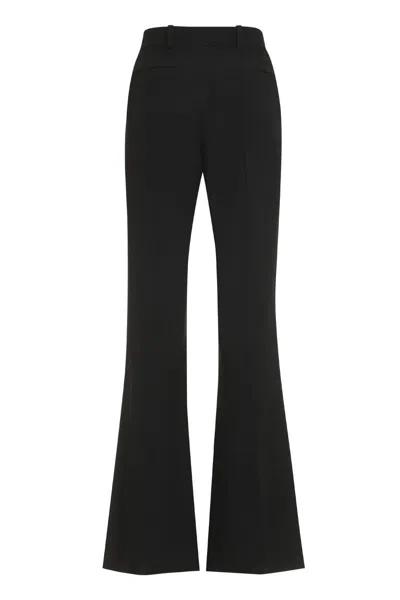 Shop Nina Ricci Flared Trousers In Black
