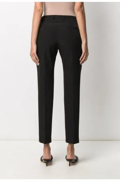 Shop Seventy Trousers In Black