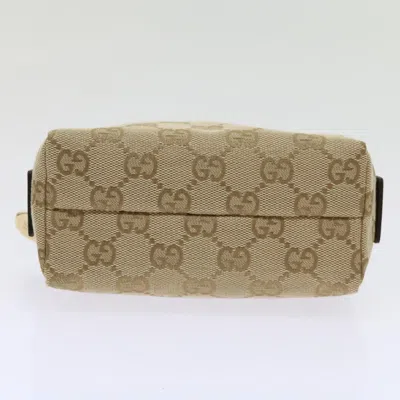 Shop Gucci Beige Canvas Clutch Bag ()