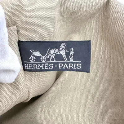 Shop Hermes Hermès Tapidocel Red Canvas Clutch Bag ()