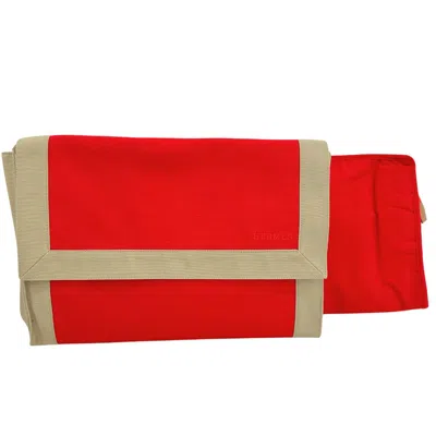 Shop Hermes Hermès Tapidocel Red Canvas Clutch Bag ()