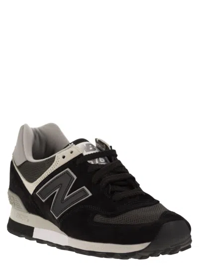 Shop New Balance 576 Sneakers