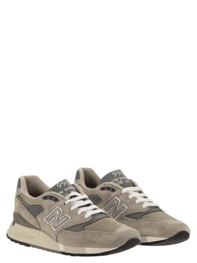Shop New Balance 998 Sneakers