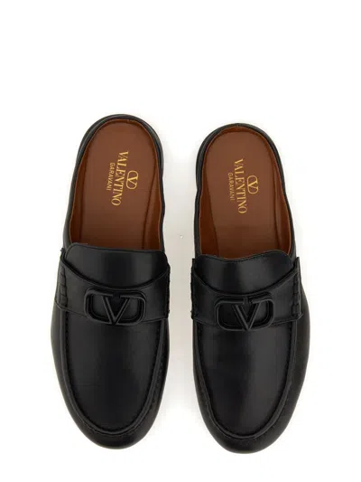 Shop Valentino Garavani Signature Vlogo Sandal In Black