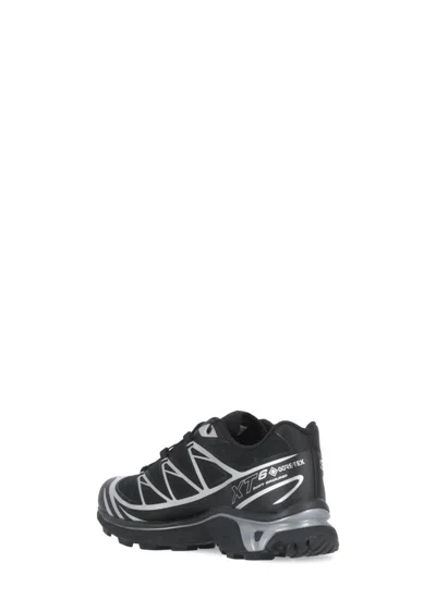 Shop Salomon Sneakers Black
