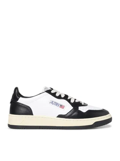 Shop Autry Sneakers Shoes In Black