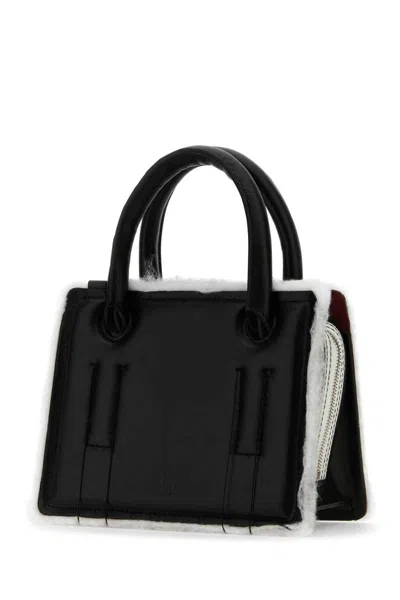 Shop Dentro Handbags. In Black
