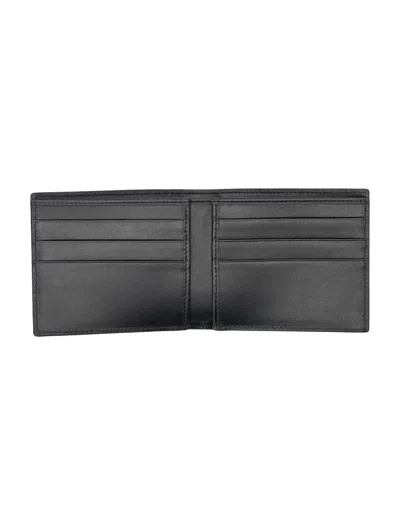 Shop Dolce & Gabbana Bifold Wallet With Embossed Logo In Black