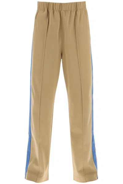 Shop Moncler Grenoble Jogger Pants With Side Bands In Beige