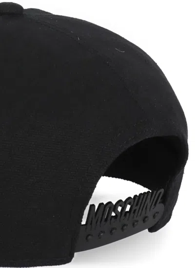 Shop Moschino Hats Black