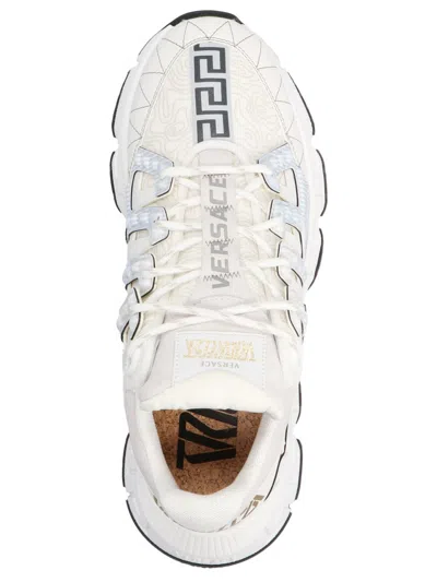 Shop Versace 'trigreca' Sneakers In White