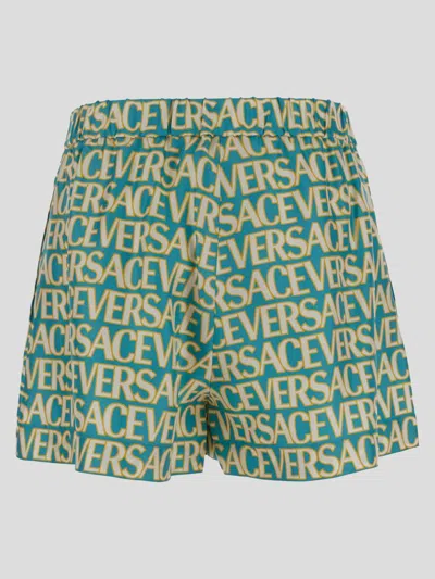 Shop Versace All-over Logo Shorts In Turquoise+ivory