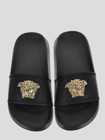 Shop Versace Sandals In Nerooro