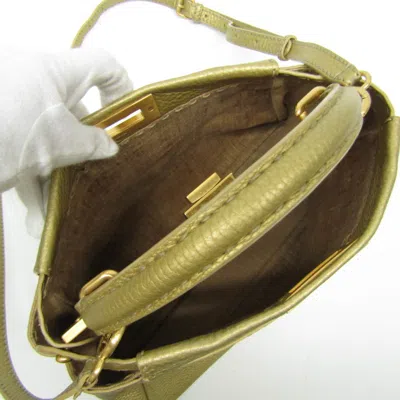 Shop Fendi Peekaboo Gold Leather Shoulder Bag ()