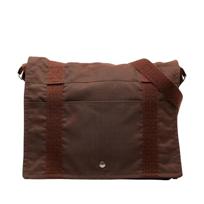 Shop Hermes Herline Canvas Shoulder Bag () In Brown
