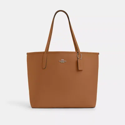 Shop Coach Outlet City Tote In Brown